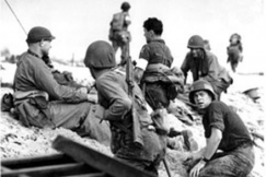 Kuva: Yhdysvaltalaisia sotilaita Normandiassa.
(1944)
AP Graphics Bank