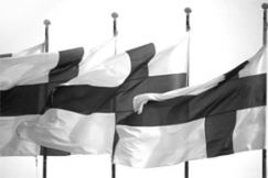 Kuva: Suomen lippuja 
liehumassa salossa.
(1994)
Pekka Sipil�.