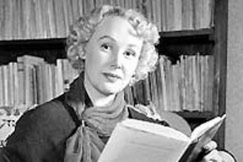 Kuva: N�yttelij� Toini Vartiainen
rentoutuu kirjan parissa.
(1950-luku)
Kalle Kultala