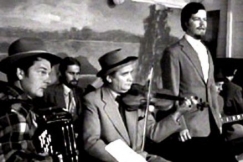 Kuva: M. A. Numminen ja uusrahvaanomainen yhtye esiintyv�t (1970). YLE kuvanauha.