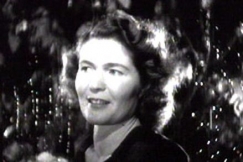 Kuva: Aale Tynni lausuu runoa sadepisaroiden ymp�r�im�n�. (1940-luku) YLE kuvanauha.