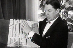 Kuva: Arkkitehti Aarne Ervi esittelee Helsingin yliopiston seudun suunnitelmia 1961. YLE kuvanauha.