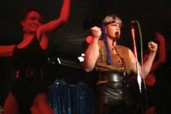 Kuva: Jokke Sepp�l� kalevalaisena Rambona. (1985) YLE kuvanauha.