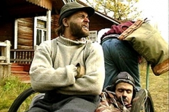 Kuva: Puukon veljekset k�rryjen kyydiss�. YLE kuvanauha.